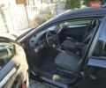 Черный Опель Астра, объемом двигателя 1.8 л и пробегом 245 тыс. км за 4900 $, фото 17 на Automoto.ua
