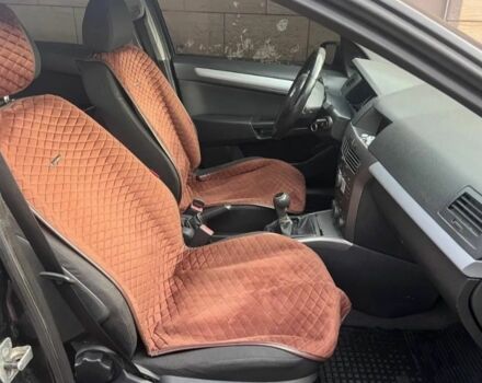 Черный Опель Астра, объемом двигателя 1.2 л и пробегом 300 тыс. км за 3400 $, фото 6 на Automoto.ua