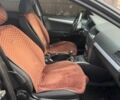 Черный Опель Астра, объемом двигателя 1.2 л и пробегом 300 тыс. км за 3400 $, фото 6 на Automoto.ua