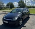 Черный Опель Астра, объемом двигателя 1.2 л и пробегом 230 тыс. км за 4299 $, фото 1 на Automoto.ua
