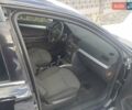 Черный Опель Астра, объемом двигателя 1.9 л и пробегом 236 тыс. км за 4700 $, фото 13 на Automoto.ua