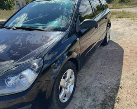 Черный Опель Астра, объемом двигателя 1.6 л и пробегом 248 тыс. км за 5200 $, фото 1 на Automoto.ua