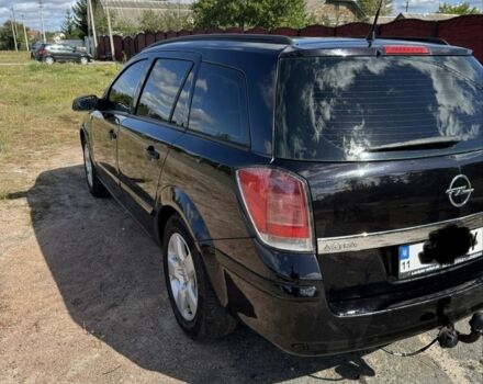 Черный Опель Астра, объемом двигателя 1.6 л и пробегом 248 тыс. км за 5200 $, фото 2 на Automoto.ua