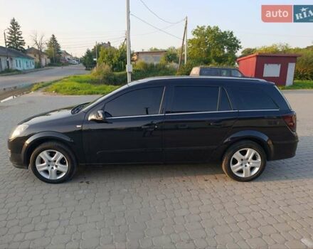 Черный Опель Астра, объемом двигателя 1.6 л и пробегом 230 тыс. км за 4300 $, фото 6 на Automoto.ua