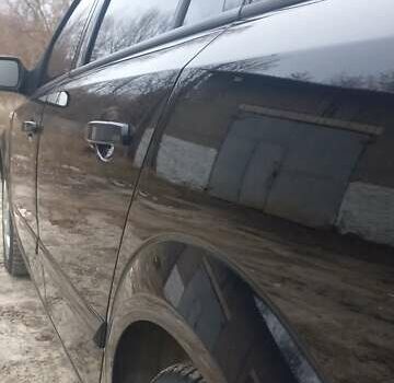 Черный Опель Астра, объемом двигателя 1.8 л и пробегом 260 тыс. км за 5200 $, фото 24 на Automoto.ua