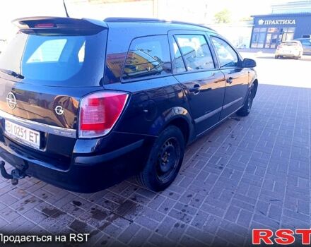 Черный Опель Астра, объемом двигателя 1.6 л и пробегом 248 тыс. км за 3499 $, фото 2 на Automoto.ua