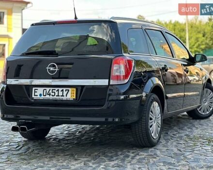 Черный Опель Астра, объемом двигателя 1.6 л и пробегом 196 тыс. км за 4850 $, фото 7 на Automoto.ua