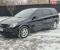 Черный Опель Астра, объемом двигателя 1.9 л и пробегом 235 тыс. км за 5900 $, фото 14 на Automoto.ua