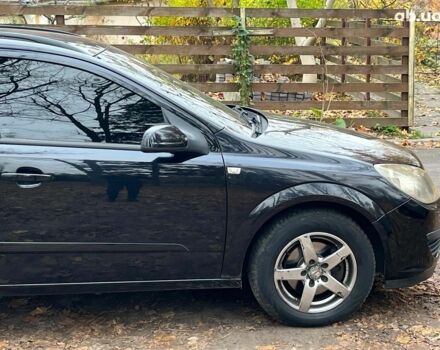 Черный Опель Астра, объемом двигателя 1.6 л и пробегом 340 тыс. км за 5140 $, фото 13 на Automoto.ua