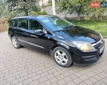 Черный Опель Астра, объемом двигателя 1.3 л и пробегом 268 тыс. км за 4550 $, фото 1 на Automoto.ua