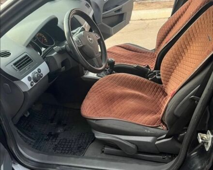 Черный Опель Астра, объемом двигателя 1.2 л и пробегом 300 тыс. км за 3400 $, фото 5 на Automoto.ua