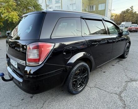 Черный Опель Астра, объемом двигателя 1.7 л и пробегом 230 тыс. км за 3999 $, фото 3 на Automoto.ua