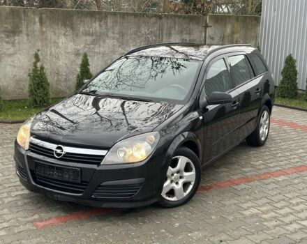 Черный Опель Астра, объемом двигателя 1.9 л и пробегом 286 тыс. км за 2050 $, фото 14 на Automoto.ua