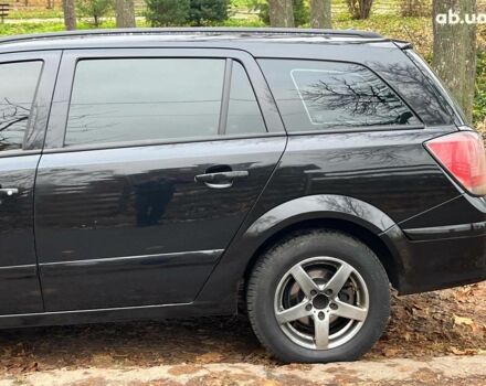 Черный Опель Астра, объемом двигателя 1.6 л и пробегом 340 тыс. км за 5140 $, фото 6 на Automoto.ua