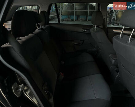 Черный Опель Астра, объемом двигателя 1.6 л и пробегом 207 тыс. км за 4999 $, фото 30 на Automoto.ua