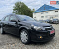 Черный Опель Астра, объемом двигателя 1.6 л и пробегом 203 тыс. км за 5200 $, фото 25 на Automoto.ua