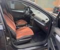 Чорний Опель Астра, об'ємом двигуна 1.25 л та пробігом 370 тис. км за 3100 $, фото 8 на Automoto.ua