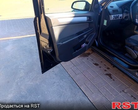 Черный Опель Астра, объемом двигателя 1.6 л и пробегом 248 тыс. км за 3499 $, фото 4 на Automoto.ua