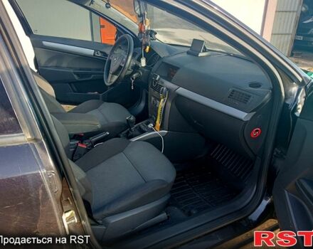 Черный Опель Астра, объемом двигателя 1.6 л и пробегом 265 тыс. км за 5700 $, фото 5 на Automoto.ua