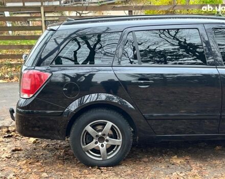 Черный Опель Астра, объемом двигателя 1.6 л и пробегом 340 тыс. км за 5140 $, фото 12 на Automoto.ua