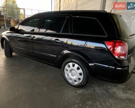 Черный Опель Астра, объемом двигателя 1.6 л и пробегом 207 тыс. км за 4999 $, фото 7 на Automoto.ua