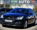 Черный Опель Астра, объемом двигателя 1.8 л и пробегом 265 тыс. км за 4950 $, фото 1 на Automoto.ua