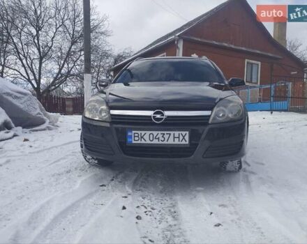 Черный Опель Астра, объемом двигателя 1.9 л и пробегом 236 тыс. км за 4700 $, фото 11 на Automoto.ua