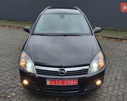 Черный Опель Астра, объемом двигателя 1.8 л и пробегом 165 тыс. км за 5650 $, фото 18 на Automoto.ua
