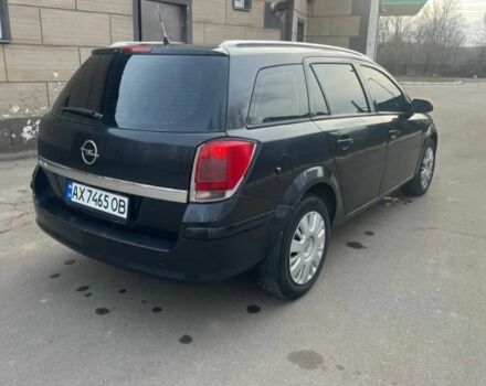Черный Опель Астра, объемом двигателя 1.2 л и пробегом 300 тыс. км за 3400 $, фото 2 на Automoto.ua
