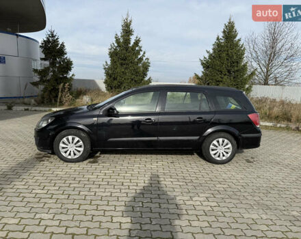 Черный Опель Астра, объемом двигателя 1.69 л и пробегом 420 тыс. км за 5500 $, фото 1 на Automoto.ua