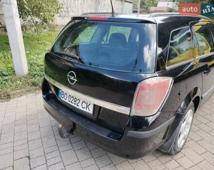 Черный Опель Астра, объемом двигателя 1.3 л и пробегом 268 тыс. км за 4550 $, фото 4 на Automoto.ua