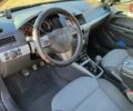 Черный Опель Астра, объемом двигателя 1.8 л и пробегом 245 тыс. км за 4900 $, фото 35 на Automoto.ua