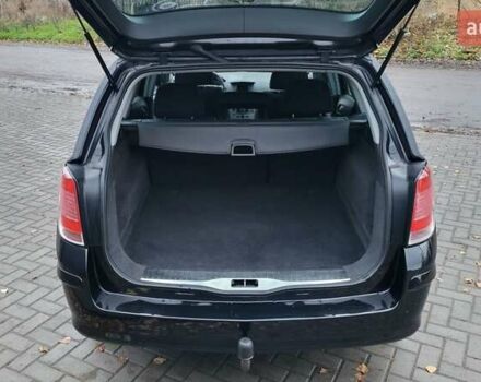 Черный Опель Астра, объемом двигателя 1.8 л и пробегом 165 тыс. км за 5450 $, фото 28 на Automoto.ua