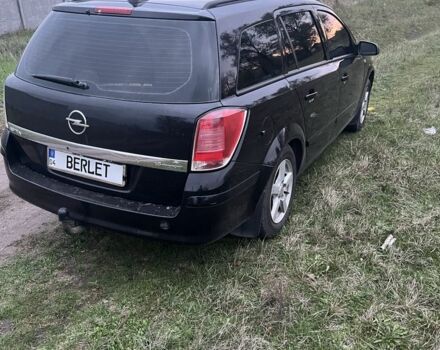 Черный Опель Астра, объемом двигателя 1.6 л и пробегом 330 тыс. км за 5200 $, фото 1 на Automoto.ua