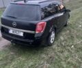 Черный Опель Астра, объемом двигателя 1.6 л и пробегом 330 тыс. км за 5200 $, фото 1 на Automoto.ua