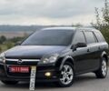Черный Опель Астра, объемом двигателя 1.6 л и пробегом 224 тыс. км за 5200 $, фото 1 на Automoto.ua
