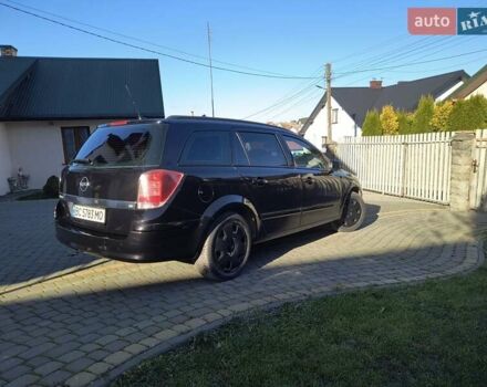 Черный Опель Астра, объемом двигателя 1.8 л и пробегом 245 тыс. км за 4900 $, фото 4 на Automoto.ua