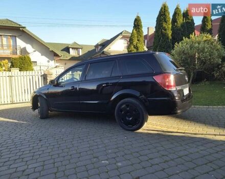 Черный Опель Астра, объемом двигателя 1.8 л и пробегом 245 тыс. км за 4900 $, фото 19 на Automoto.ua