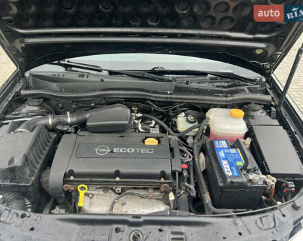 Черный Опель Астра, объемом двигателя 1.6 л и пробегом 208 тыс. км за 4000 $, фото 16 на Automoto.ua