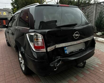 Черный Опель Астра, объемом двигателя 1.9 л и пробегом 311 тыс. км за 2930 $, фото 2 на Automoto.ua