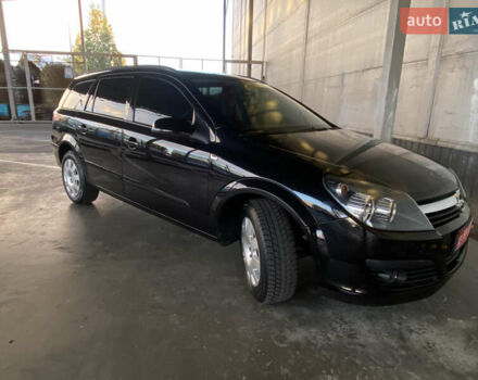 Черный Опель Астра, объемом двигателя 1.6 л и пробегом 207 тыс. км за 4999 $, фото 10 на Automoto.ua