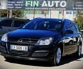 Черный Опель Астра, объемом двигателя 1.8 л и пробегом 265 тыс. км за 4950 $, фото 1 на Automoto.ua