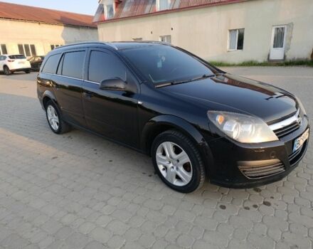 Черный Опель Астра, объемом двигателя 1.6 л и пробегом 230 тыс. км за 3900 $, фото 7 на Automoto.ua