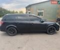 Чорний Опель Астра, об'ємом двигуна 1.25 л та пробігом 370 тис. км за 3100 $, фото 2 на Automoto.ua