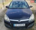 Черный Опель Астра, объемом двигателя 1.8 л и пробегом 223 тыс. км за 5600 $, фото 1 на Automoto.ua