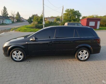 Черный Опель Астра, объемом двигателя 1.6 л и пробегом 230 тыс. км за 3900 $, фото 2 на Automoto.ua