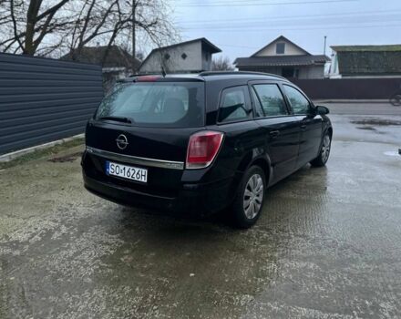 Черный Опель Астра, объемом двигателя 1.9 л и пробегом 300 тыс. км за 2500 $, фото 6 на Automoto.ua