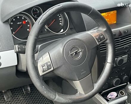 Черный Опель Астра, объемом двигателя 1.6 л и пробегом 340 тыс. км за 5140 $, фото 30 на Automoto.ua