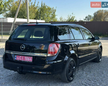 Черный Опель Астра, объемом двигателя 1.6 л и пробегом 241 тыс. км за 5700 $, фото 12 на Automoto.ua