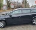 Черный Опель Астра, объемом двигателя 1.8 л и пробегом 165 тыс. км за 5650 $, фото 7 на Automoto.ua